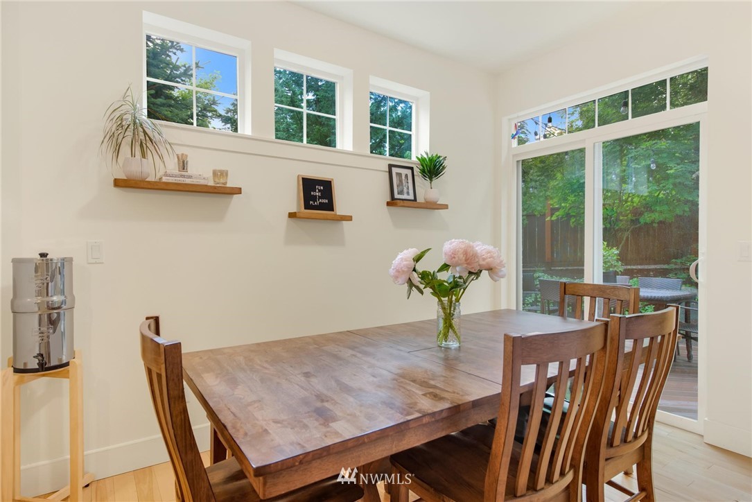 16203 41st Drive Southeast Bothell, WA 98012 - Photo 8 of 20 a view of a dining room with furniture window and outside view