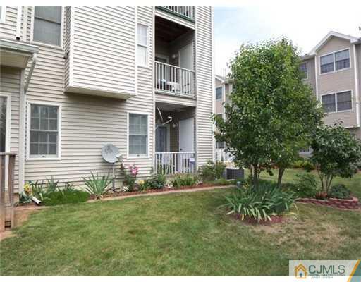 1219 Edpas Road New Brunswick, NJ 08901 - Photo 12 of 14 a front view of a house with a yard