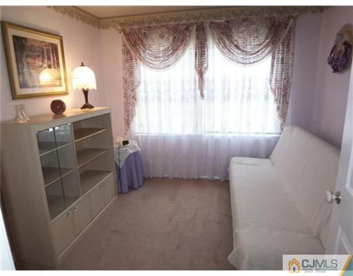 1219 Edpas Road New Brunswick, NJ 08901 - Photo 8 of 14 a room with furniture and a window