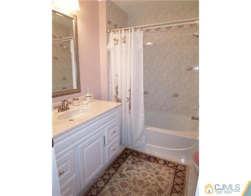 1219 Edpas Road New Brunswick, NJ 08901 - Photo 9 of 14 a bathroom with a bathtub and a shower