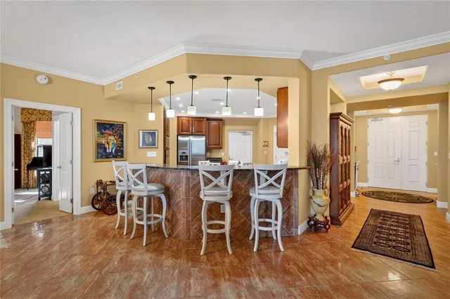 a living room with fireplace furniture and a flat screen tv