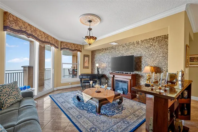 a living room with furniture and a table