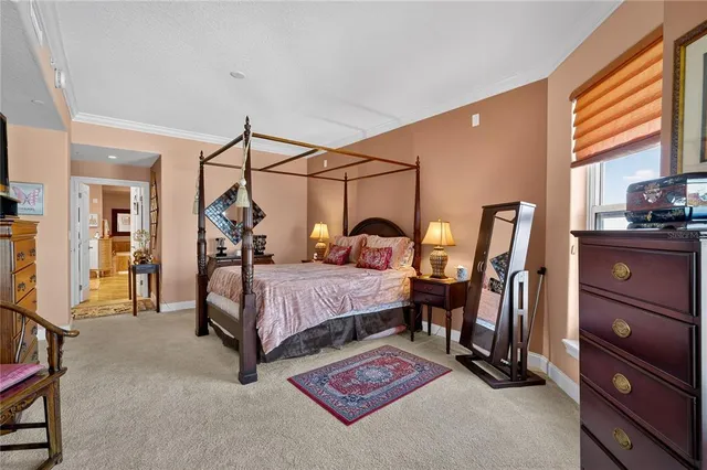a spacious bathroom with a granite countertop sink and a mirror