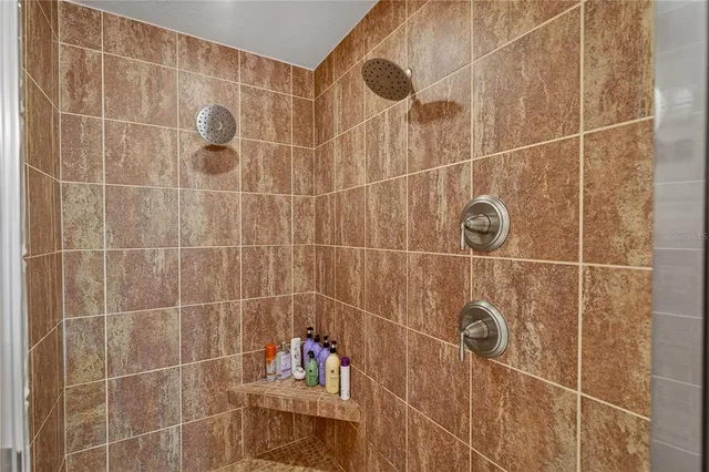 a bedroom with bed and window