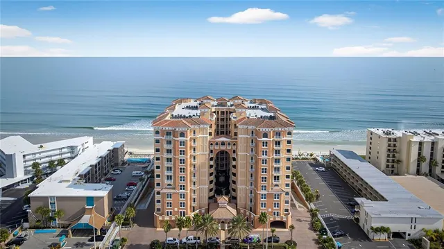 a view of roof deck with two chairs and wooden floor