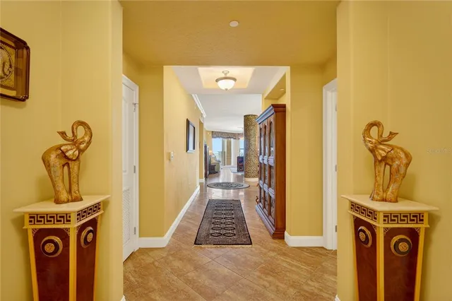 a large kitchen with a table and chairs in it