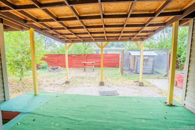 a view of a porch with a backyard