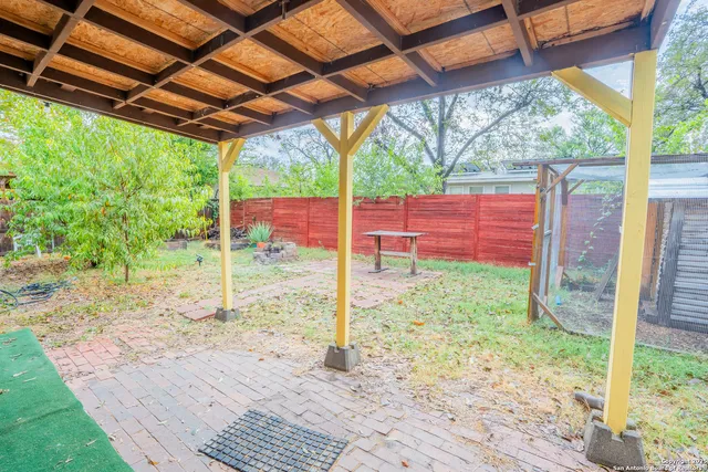 a house view with a backyard space