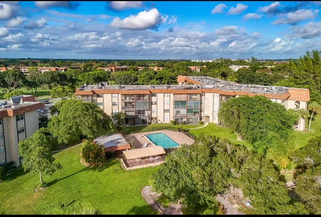 a view of a city with a lake in the background
