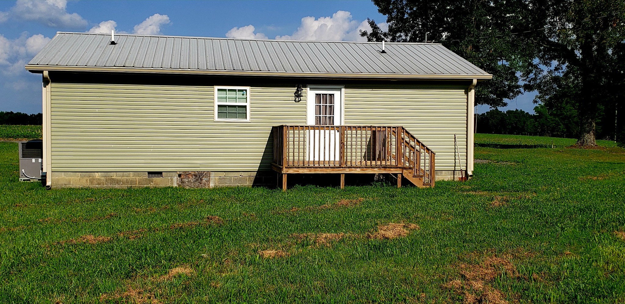 67 Orville Duke Road Morrison, TN 37357 - Photo 2 of 13 a view of a house with a backyard