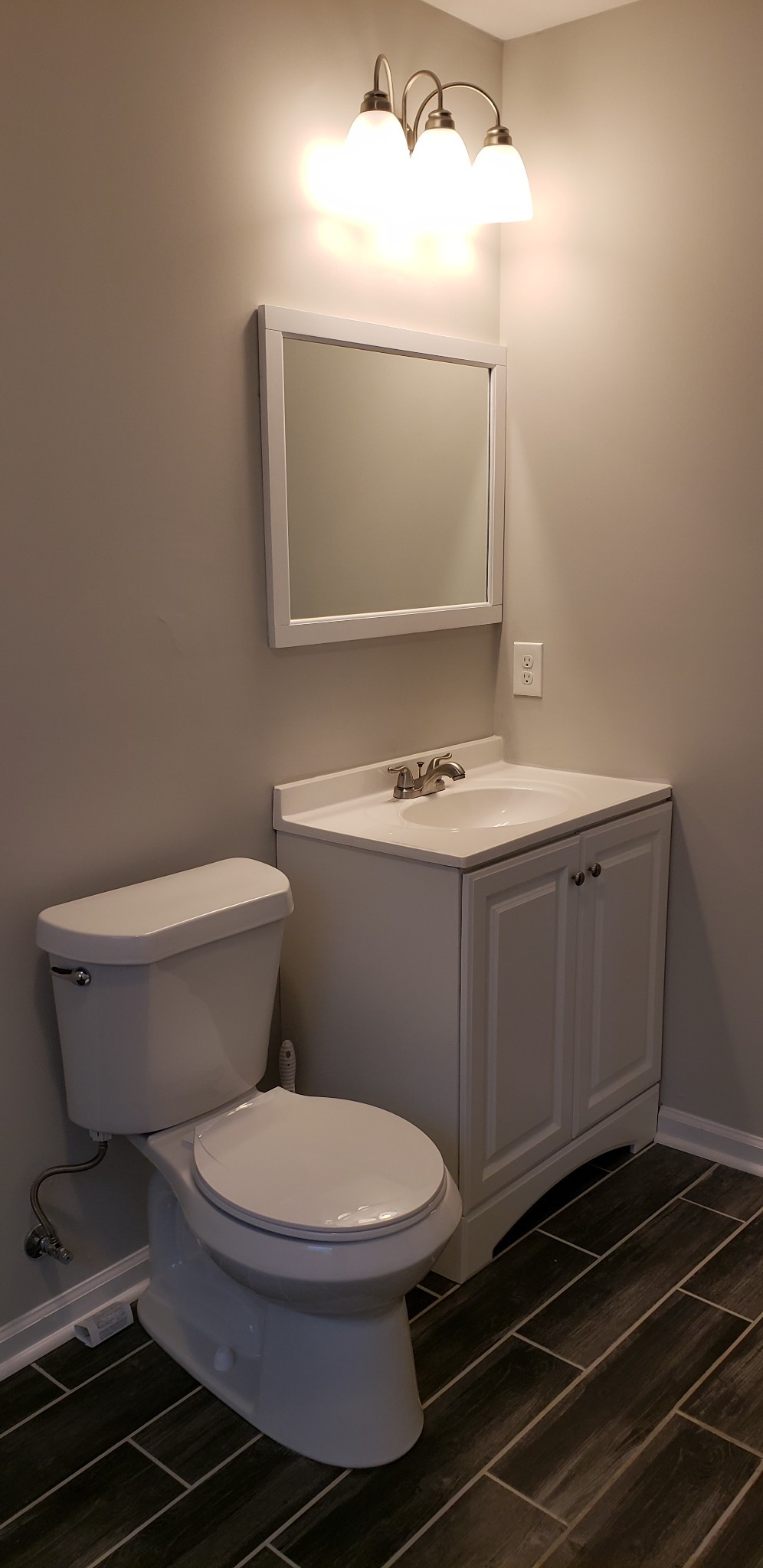 67 Orville Duke Road Morrison, TN 37357 - Photo 10 of 13 a bathroom with a toilet sink and mirror