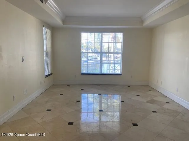 a view of kitchen with wooden floor and window