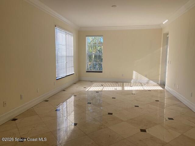 2240 Front Street, Unit 104 Melbourne, FL 32901 - Photo 14 of 37 a view of kitchen with wooden floor and window