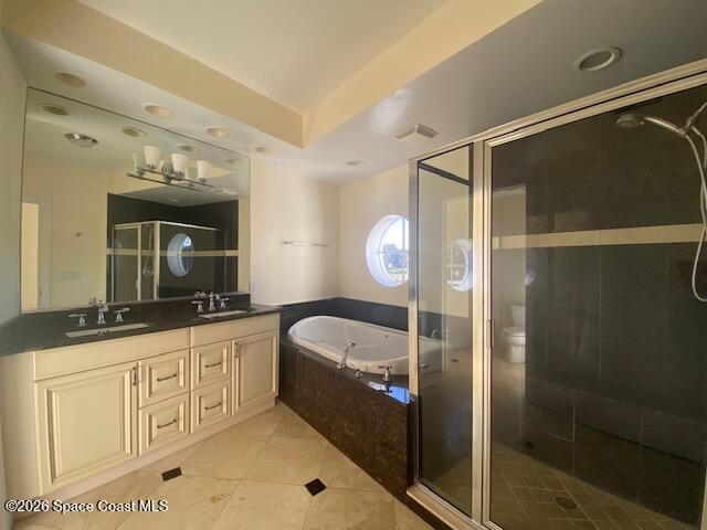 2240 Front Street, Unit 104 Melbourne, FL 32901 - Photo 15 of 37 a bathroom with a tub a sink and a large mirror