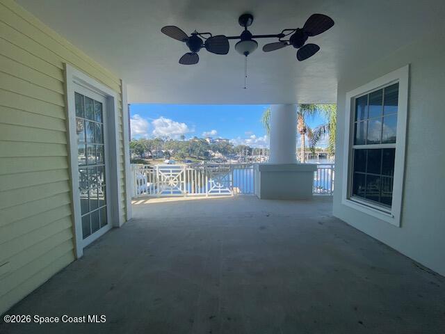 2240 Front Street, Unit 104 Melbourne, FL 32901 - Photo 20 of 37 a view of a room with a ceiling fan and a window