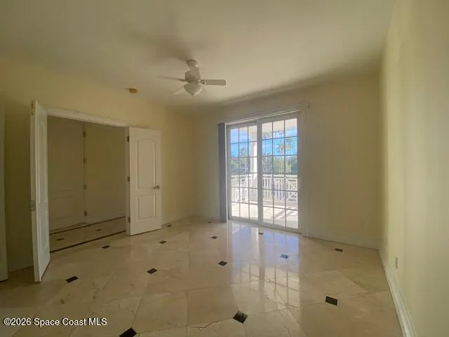 a view of a balcony with furniture