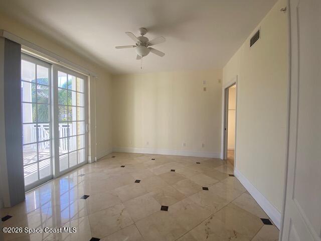 2240 Front Street, Unit 104 Melbourne, FL 32901 - Photo 26 of 37 a view of an empty room with a window