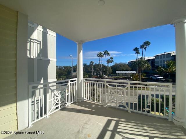 2240 Front Street, Unit 104 Melbourne, FL 32901 - Photo 27 of 37 a view of a balcony with furniture