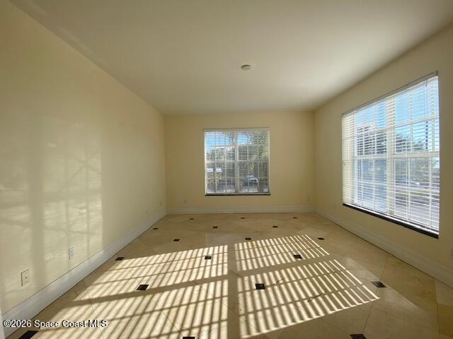 2240 Front Street, Unit 104 Melbourne, FL 32901 - Photo 31 of 37 a view of an empty room with a window
