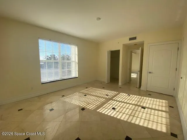 a view of a lake with a sitting area