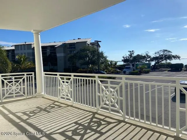 a view of backyard with swimming pool and outdoor seating
