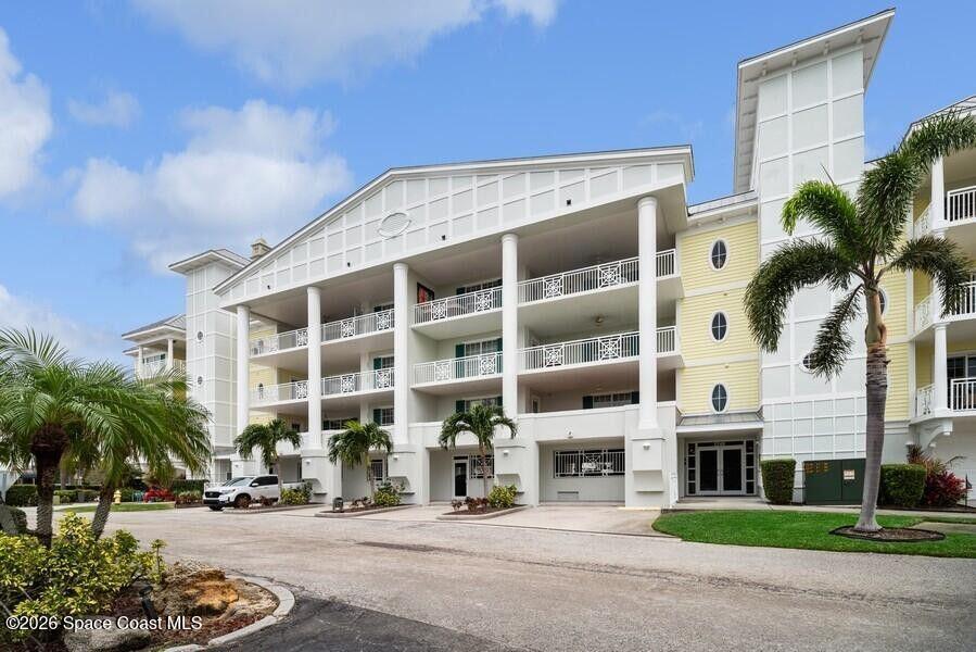 2240 Front Street, Unit 104 Melbourne, FL 32901 - Photo 37 of 37 a front view of building with yard