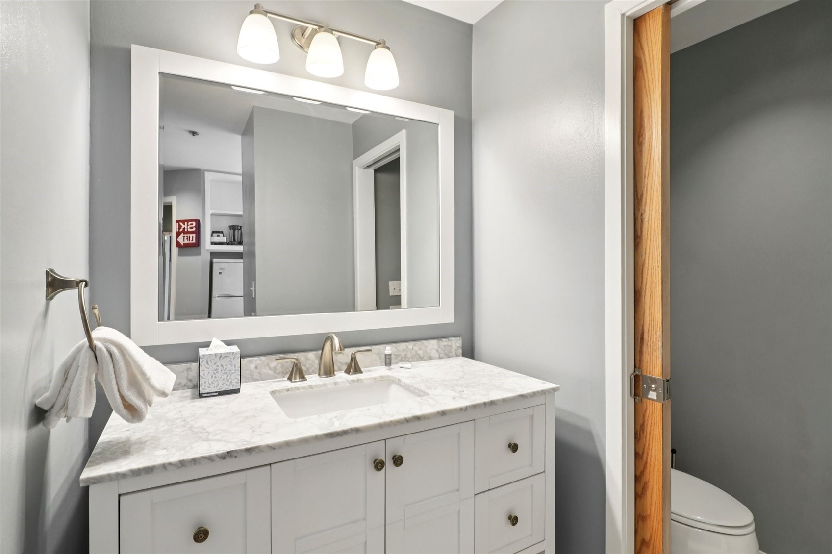 24 River Run Road, Unit 2907 Keystone, CO 80435 - Photo 18 of 37 a bathroom with a granite countertop sink and a mirror