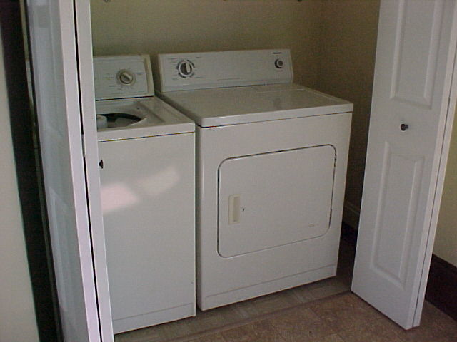 340 Ogden Street Capron, IL 61012 - Photo 2 of 11 a utility room with dryer and washer