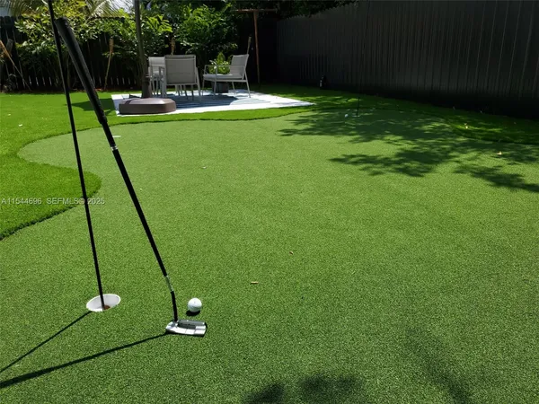 a view of a backyard with a slide