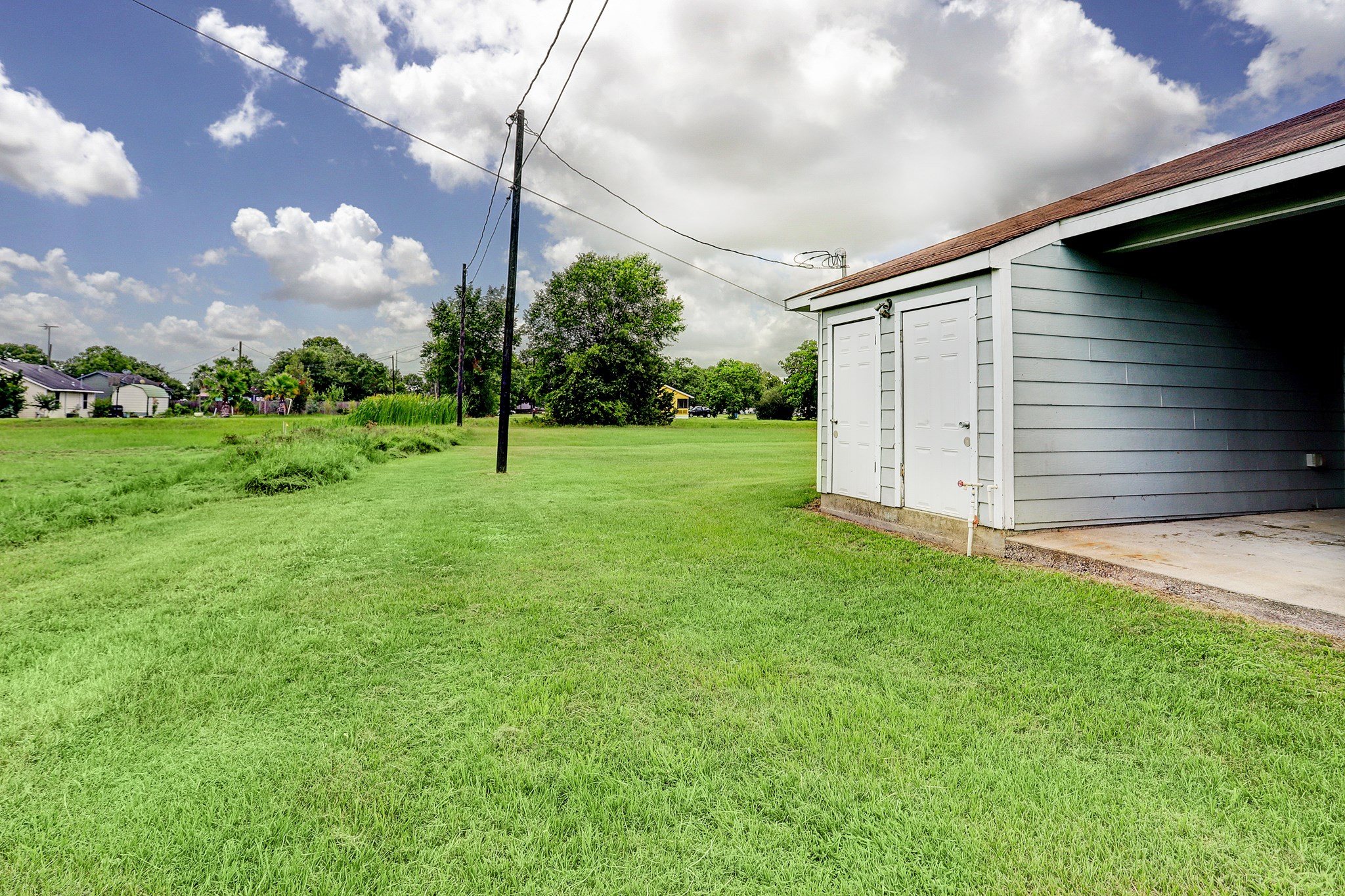 330 6th Street Hempstead, TX 77445 - Photo 13 of 13 a view of an house with backyard
