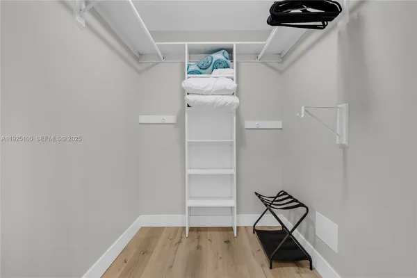 a view of a room with rack on the wall