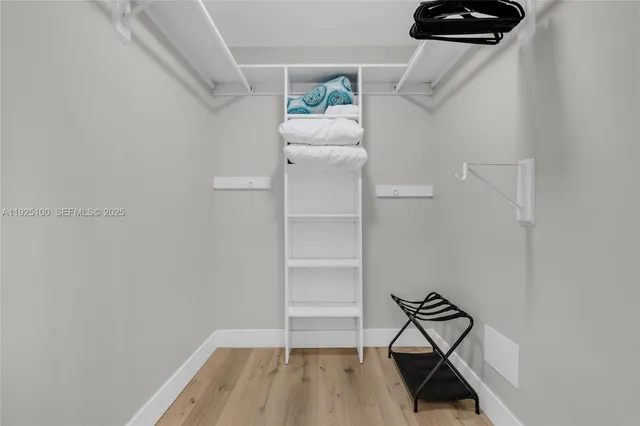 a view of a room with rack on the wall