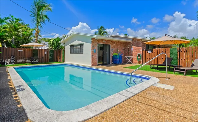 a view of swimming pool with patio