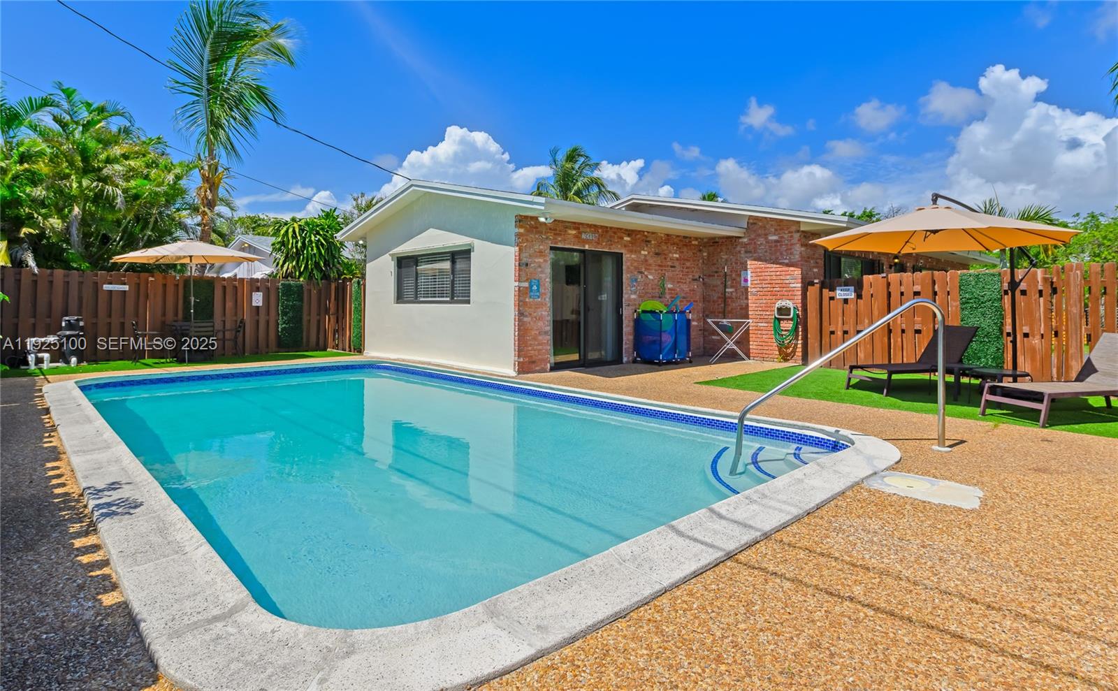 1204 Northeast 7th Street Pompano Beach, FL 33060 - Photo 40 of 43 a view of a house with swimming pool