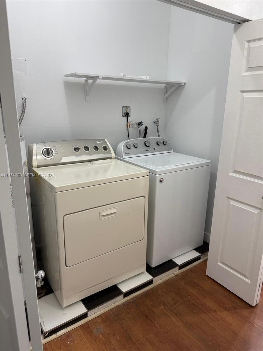 26120 Southwest 130th Avenue Homestead, FL 33032 - Photo 32 of 34 a utility room with dryer and washer