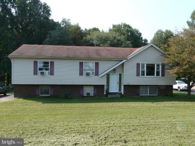 6158 Telegraph Road Elkton, MD 21921 - Photo 12 of 12 a view of a house with a garden and deck