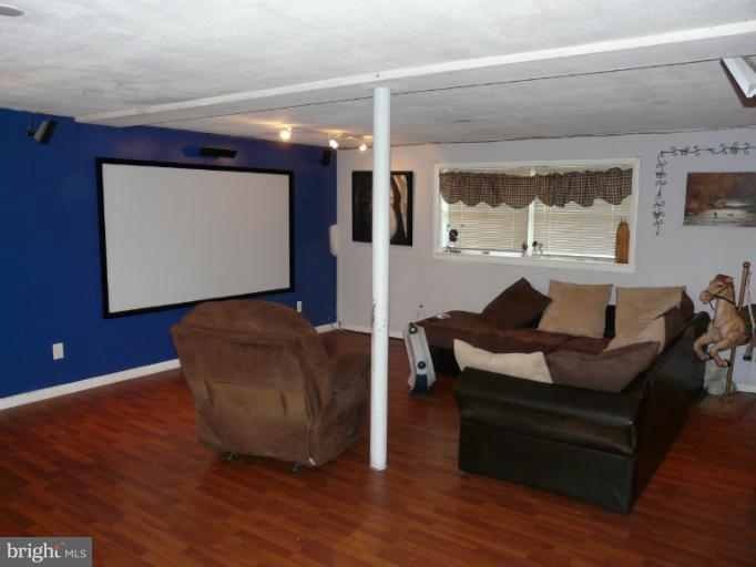 6158 Telegraph Road Elkton, MD 21921 - Photo 5 of 12 a living room with furniture and a flat screen tv