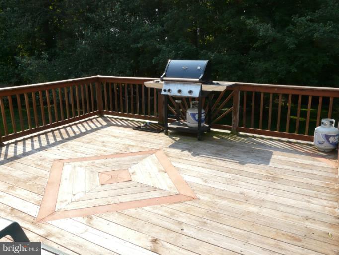 6158 Telegraph Road Elkton, MD 21921 - Photo 9 of 12 a view of balcony with wooden floor and fence