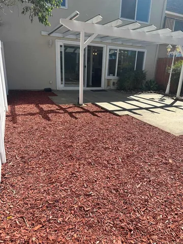 a view of house with yard