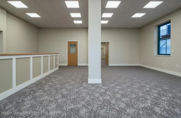 a room with lots of furniture and clutter