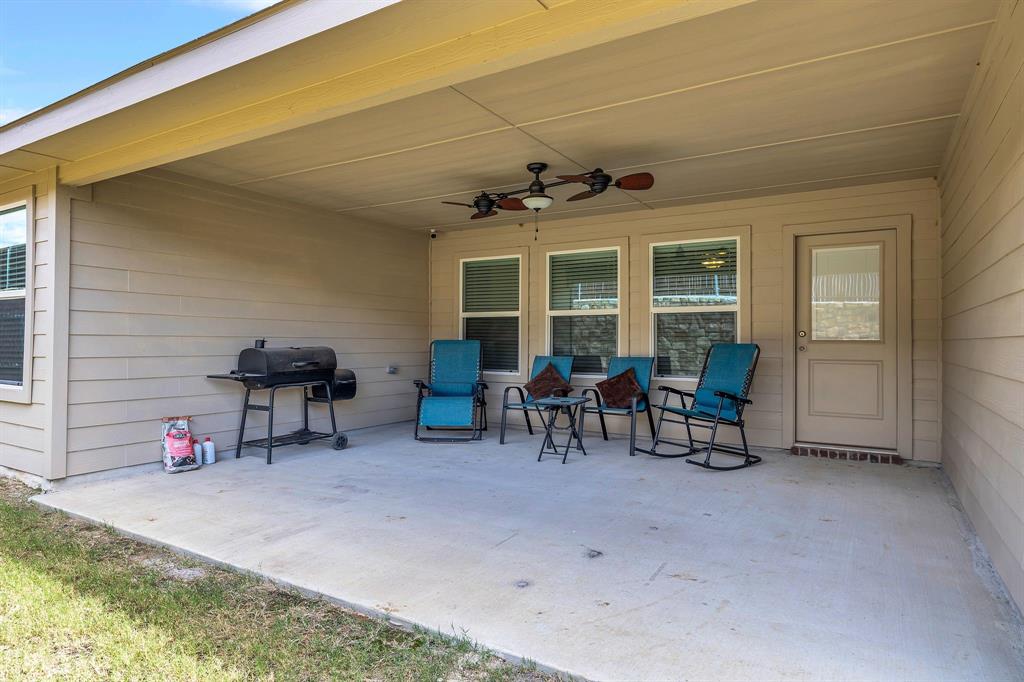 728 Golden Gate Pk Road Alvarado, TX 76009 - Photo 22 of 23 View of patio featuring grilling area and ceiling fan