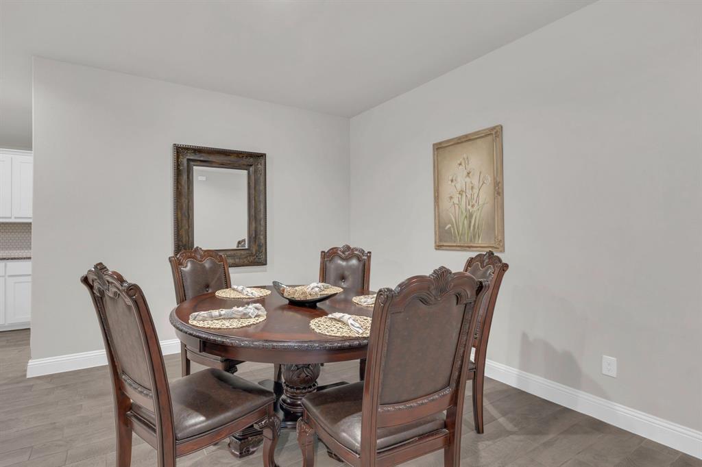 728 Golden Gate Pk Road Alvarado, TX 76009 - Photo 8 of 23 Dining area with baseboards and light wood finished floors