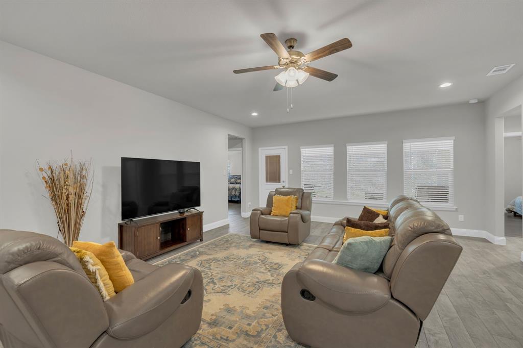 728 Golden Gate Pk Road Alvarado, TX 76009 - Photo 10 of 23 Living room featuring light wood-style flooring, recessed lighting, and ceiling fan