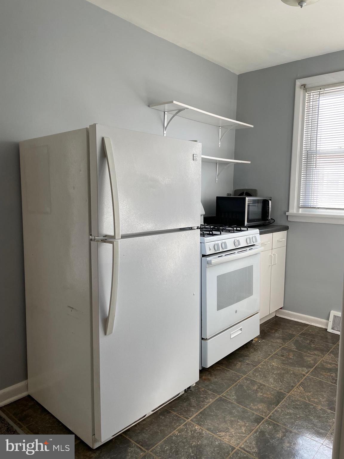 8412 Jackson Street Philadelphia, PA 19136 - Photo 11 of 45 a utility room with dryer and washer