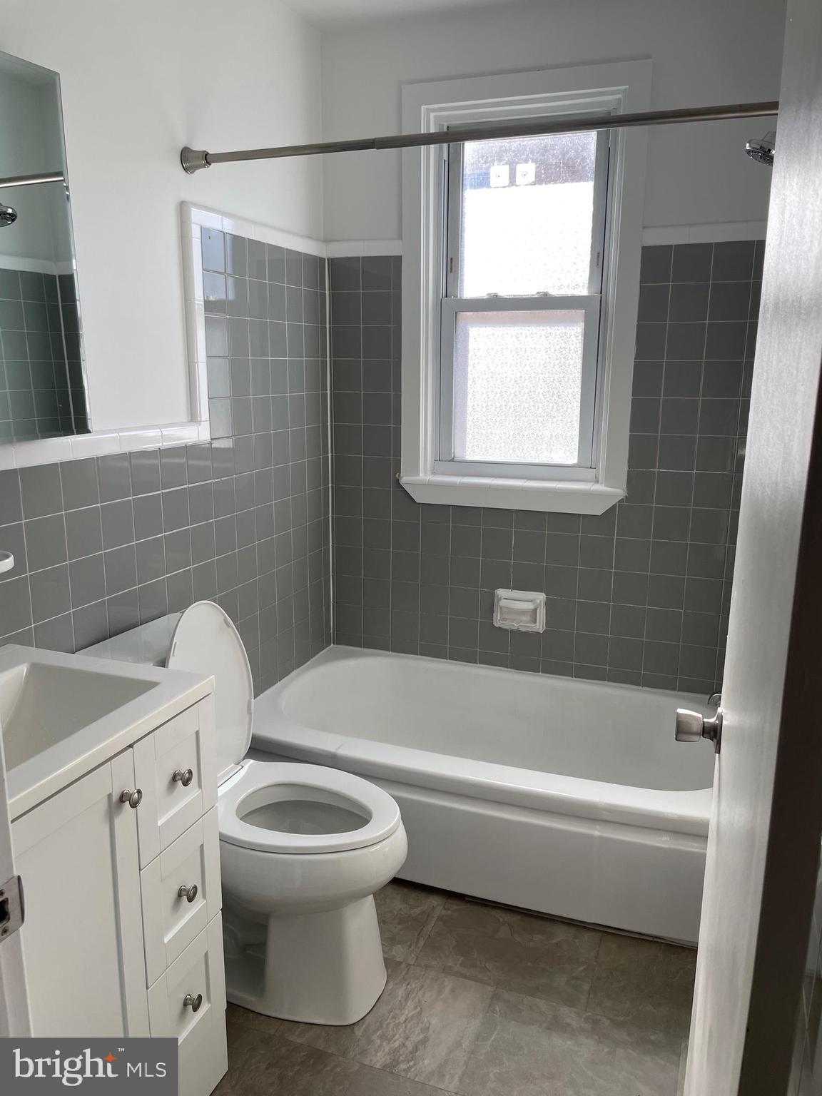 8412 Jackson Street Philadelphia, PA 19136 - Photo 13 of 45 a bathroom with a toilet a sink and bathtub