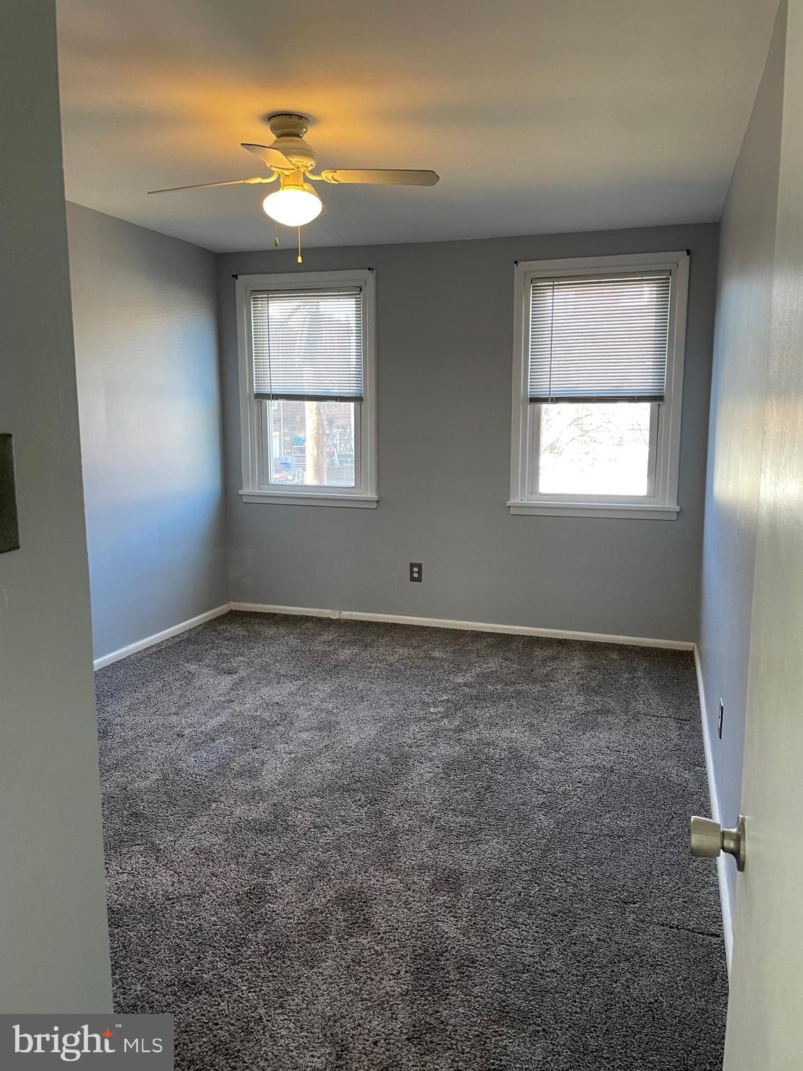 8412 Jackson Street Philadelphia, PA 19136 - Photo 14 of 45 an empty room with windows and fan view