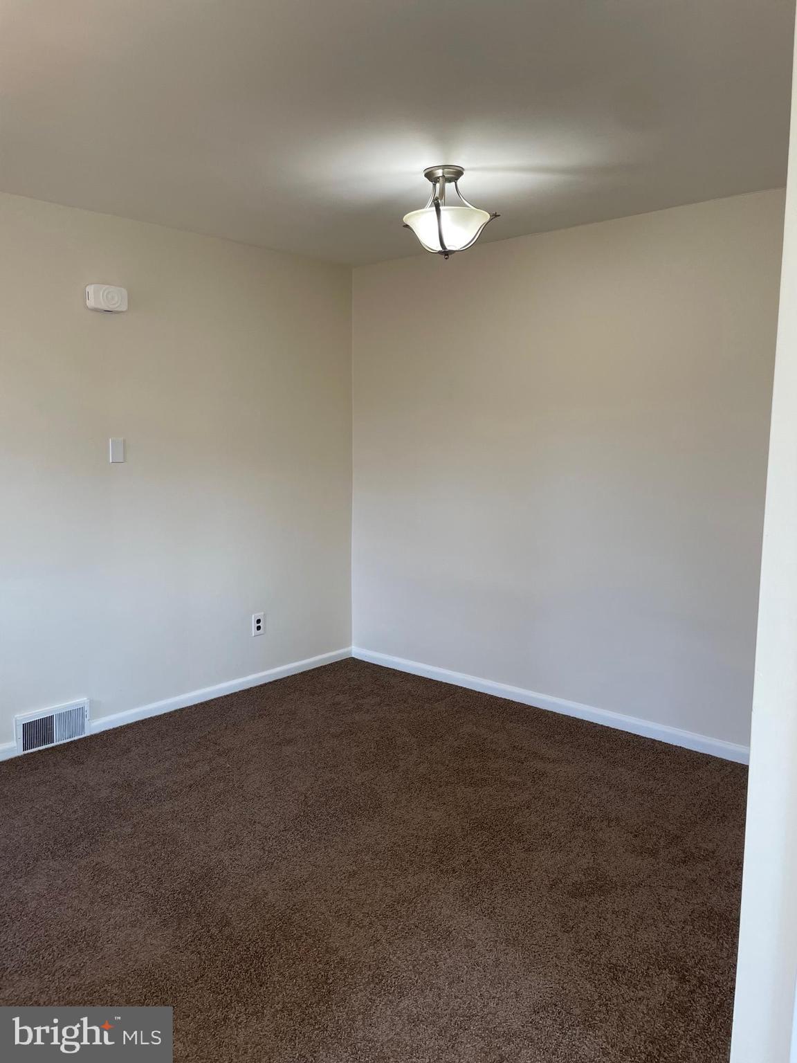 8412 Jackson Street Philadelphia, PA 19136 - Photo 23 of 45 an empty room with a view of bathroom