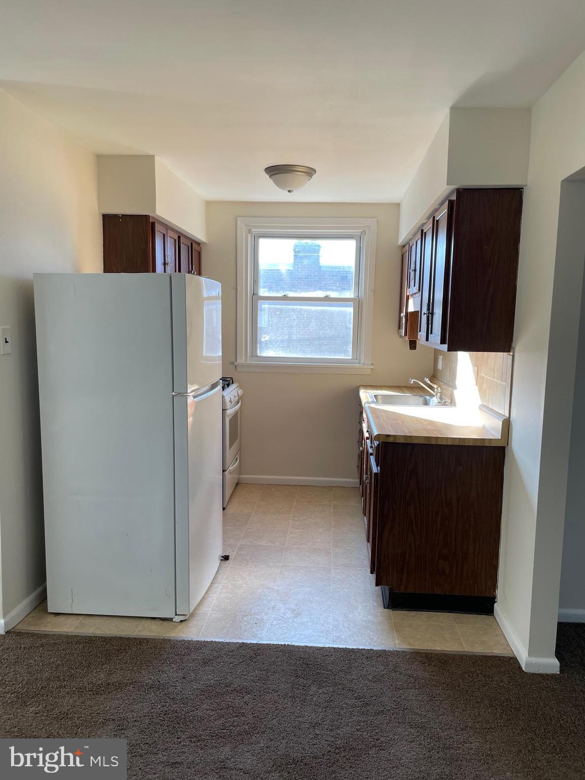 8412 Jackson Street Philadelphia, PA 19136 - Photo 25 of 45 a bathroom with a sink and a mirror