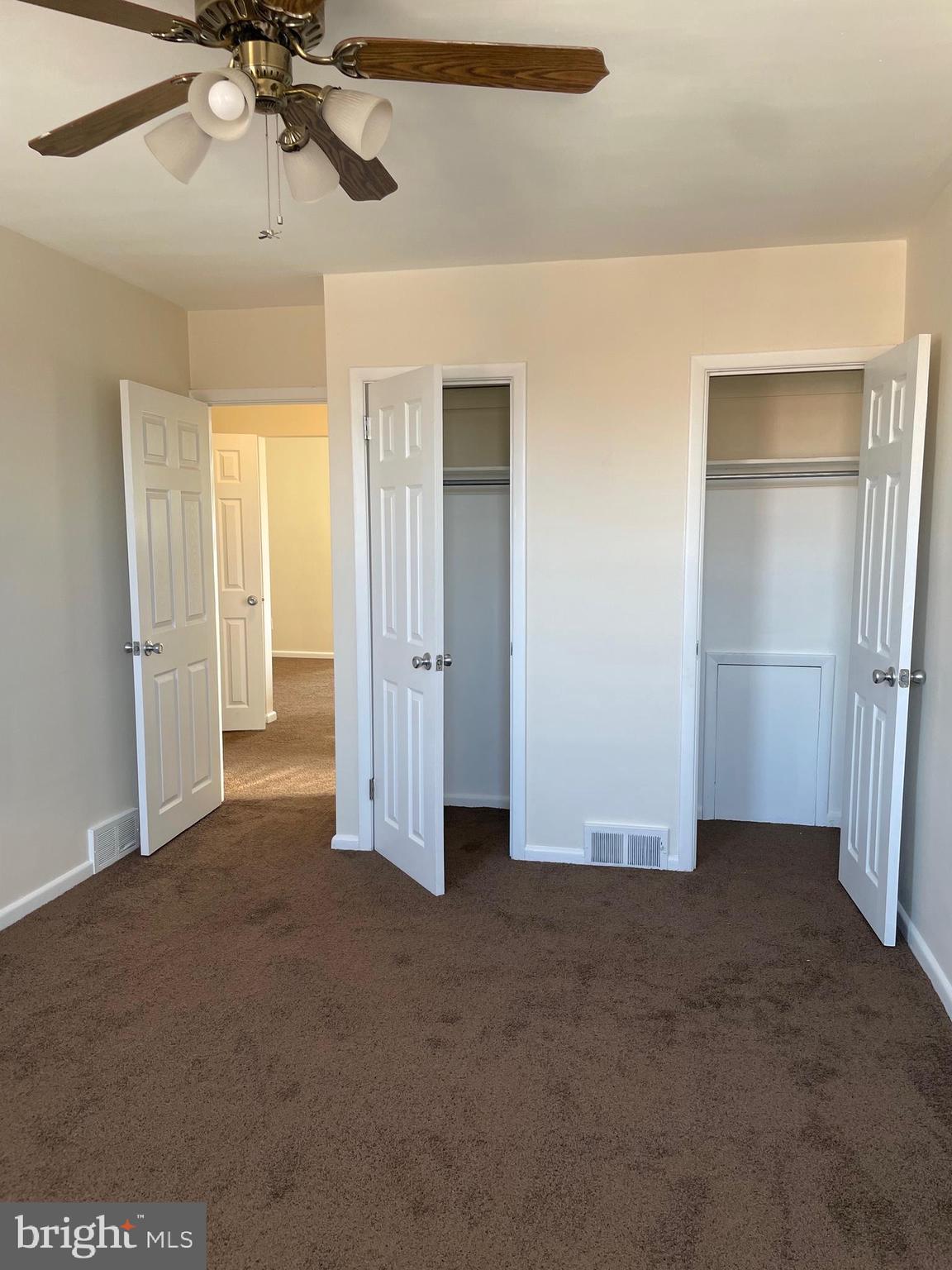 8412 Jackson Street Philadelphia, PA 19136 - Photo 31 of 45 an empty room with closet and windows