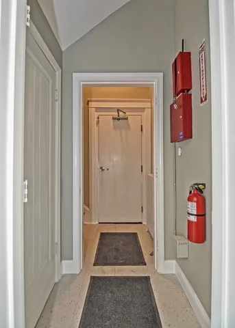 a view of room with window and hardwood floor